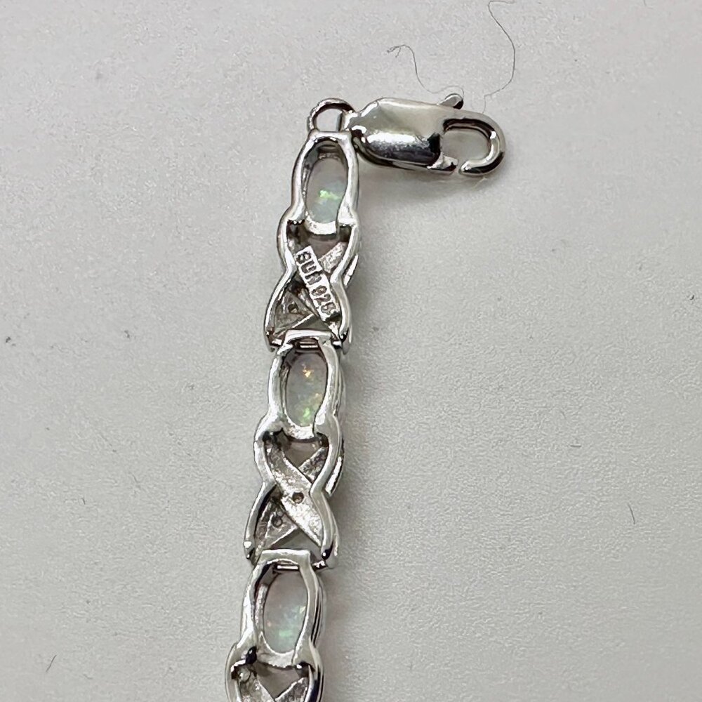 XO Infinity Bracelet Lab Created Opal and Diamond Accent in Sterling Silver Sett - Picture 7 of 7